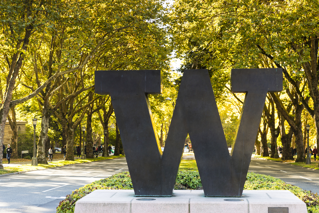 North UW campus W statue in the sunshine with fall color