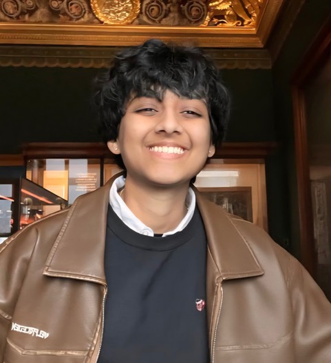 Vidhi smiles at the camera.
